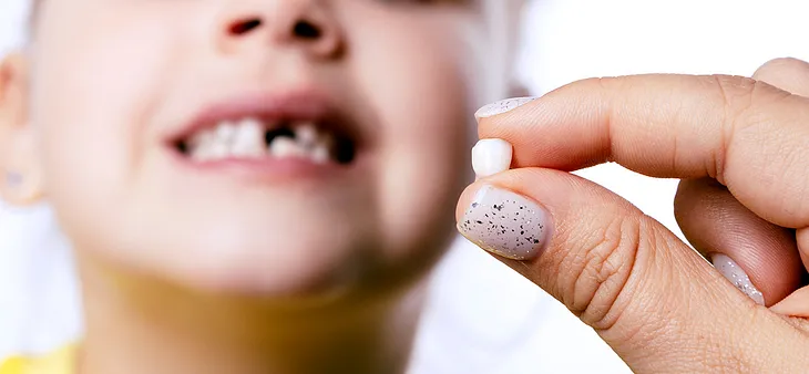 The tooth fairy is as real as the easter bunny. Photo by burmistrovaiuliia.