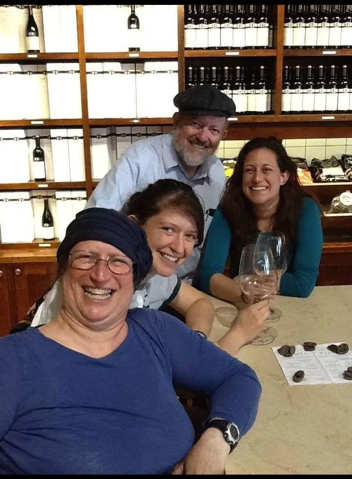 a picture with me, my mom, dad and sister at a winery
