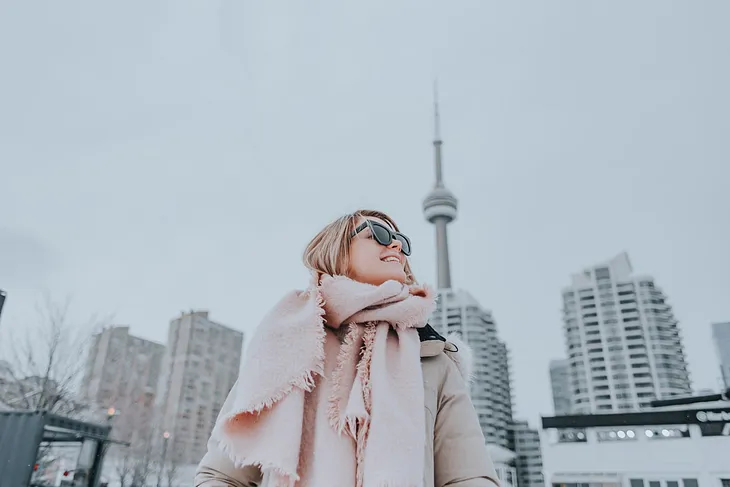 person wearing sunglasses in winter in Toronto CA