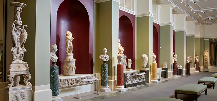 Landscape image of the Greek and Roman Statue hall at the Ashmolean Museum in Oxford