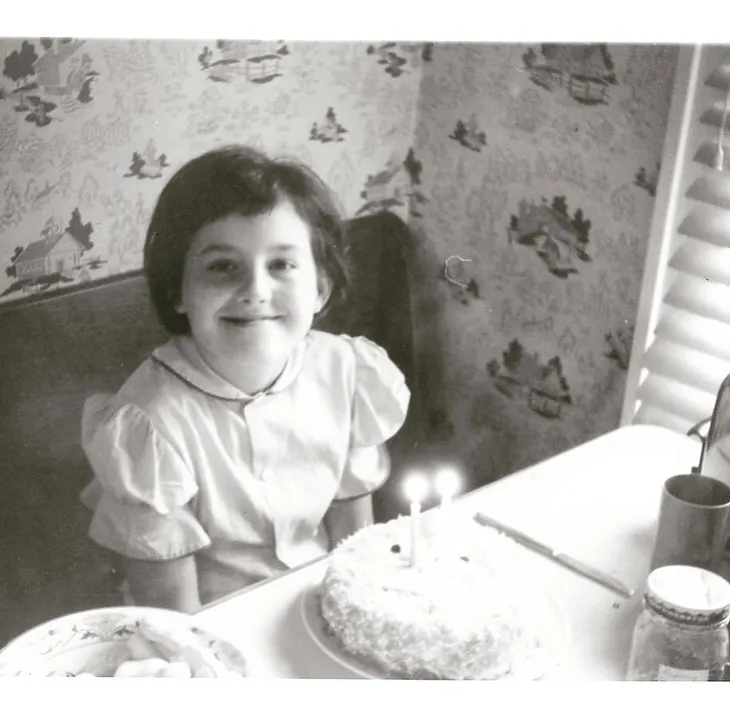 — — This photo shows me at my 5th Birthday party in 1956 at the home of my paternal grandparents in Escanaba, Michigan. Both of my grandparents were alive and well. Grandma would pass away a year later, and Grandpa two years later when I was sick with encephalitis. — -