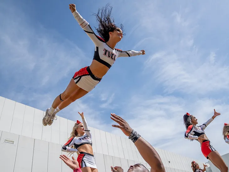 The Evolution of Cheerleading: Unveiling its Athletic Prowess and Claiming its Status as a Sport