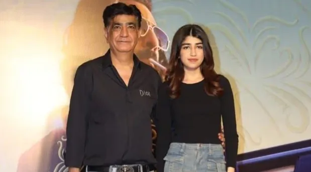 Krishan Kumar with his daughter Tishaa Kumar at the screening of Animal.