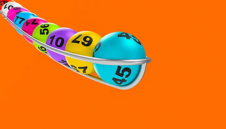 A row of coloured balls with numbers on them