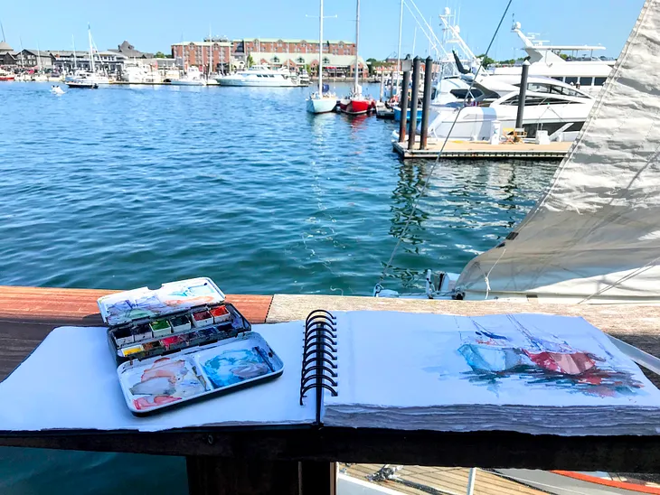 Sketching on the docks in Newport, RI photo by Anne Kullaf
