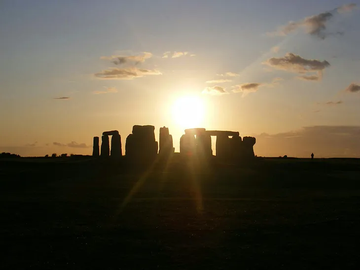 Sun rising over Stonehenge.