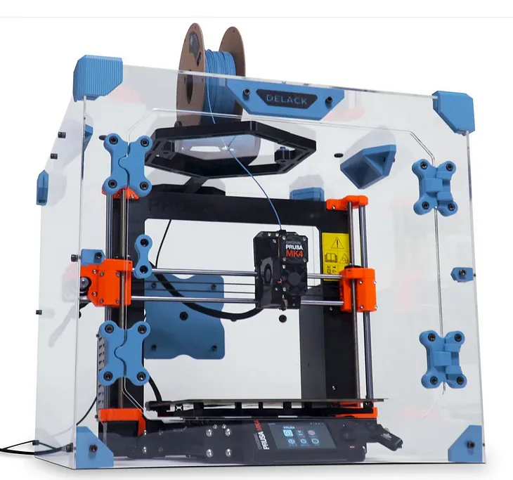 A Prusa Printer is shown inside a DELACK enclosure