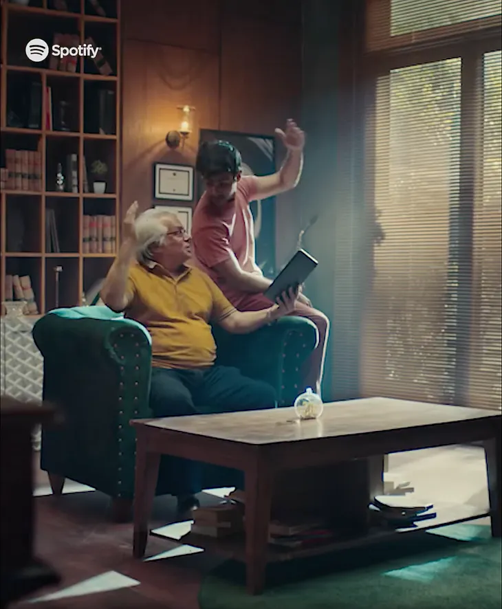 Digital Video Commercial from Spotify Pakistan. This is a screen grab of a moment showing a grandfather, played by Naeem Shaikh, with his grandson listening to their favourite song on Spotify Pakistan.