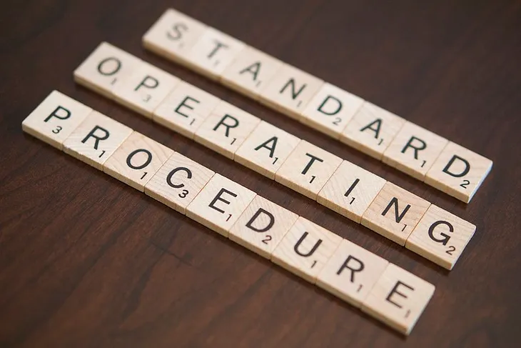 Standard operating procedures, spelled out in Scrabble tiles