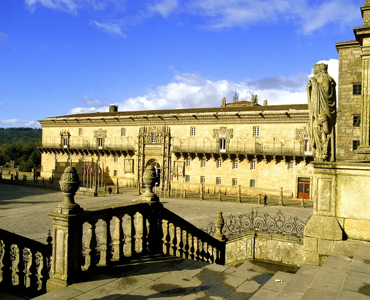 The façade of the Hostal de los Reyes Católicos hotel in Santiago de Compostela, Spain