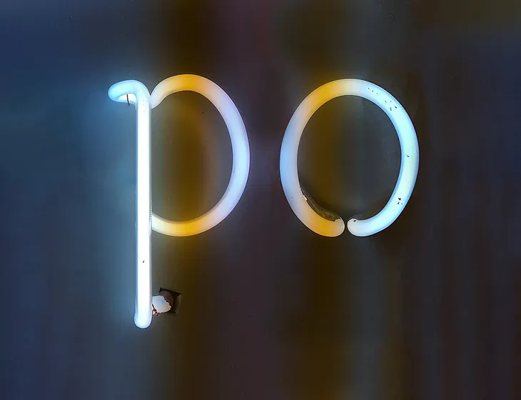 Neon letters: PO