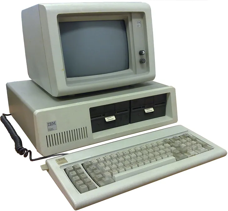 An IBM PC 5150 with monitor and keyboard