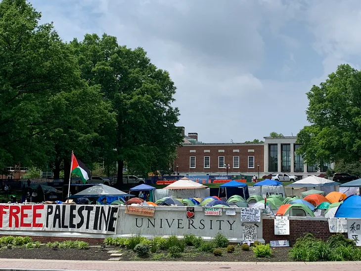 The Free Palestine encampment at Johns Hopkins University (Photo by the author, May 2024); April 2025 update: dozens of JHU students’ visas have been revoked.