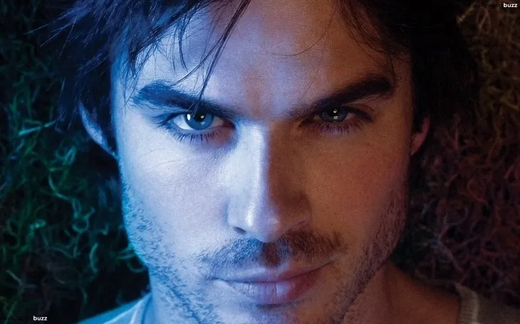 Close up of Damon Salvatore smoldering at the camera