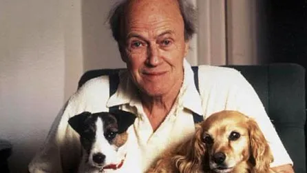 Photo of author, Roald Dahl, with two dogs