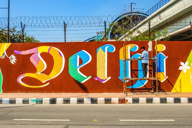 Street art with word “Delhi”