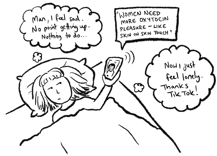 A person lying in bed on their phone feeling lonely