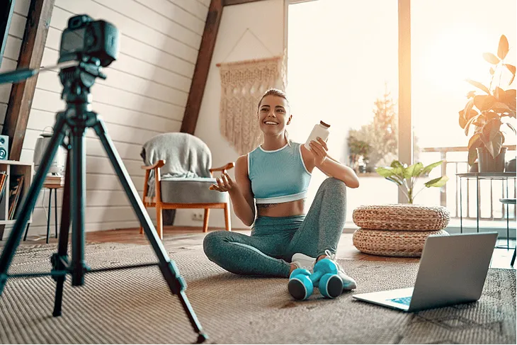 How do fitness influencers on social media affect our consumer behavior and daily lives?