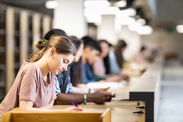 Student studies in library