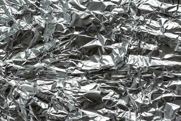 Why is Aluminum Foil Only Shiny on One Side?