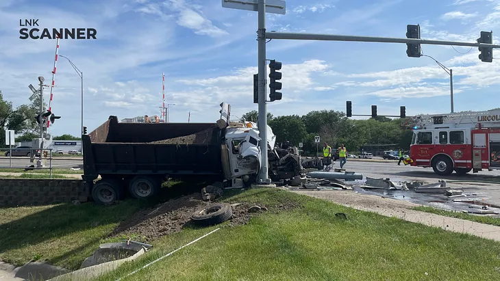 Dump Truck Driver Collides With Traffic Pole, Shutting Down Old Cheney and 56th Street