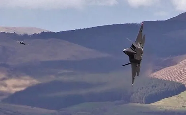 Watch an F-22 Thread the Mach Loop — Low, Fast and Loud