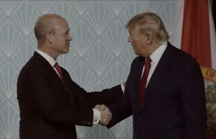 Donald Trump shaking hands with Kevin Roberts, President of the Heritage Foundation, at a keynote speaking  event— symbolizing collaboration on Project 2025