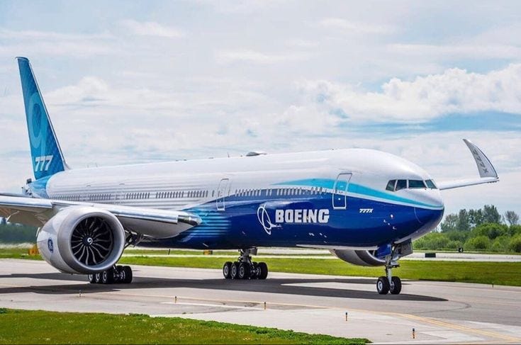 Boeing 777–9 on the ground with wingtips folded