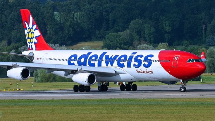 Leisure-focused operations: An Edelweiss Airbus A340–313 prepares for departure at Zurich Airport. As a leisure subsidiary of the Lufthansa Group, Edelweiss continues to utilize these quadjets to serve long-haul holiday destinations, maintaining a vital, albeit aging, fleet of widebodies in 2026.