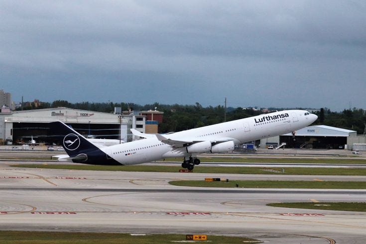 Final rotation of the quadjet era: A close-up view of a Lufthansa Airbus A340–600 lifting its nose gear and complex four-engine clustering. Bathed in the dramatic golden-hour light of late evening, this perspective highlights the immense power and engineering complexity of the ‘stretched’ quadjet. As Lufthansa winds down its final A340 operations, images like this capture the raw visual drama of these departing aviation giants.