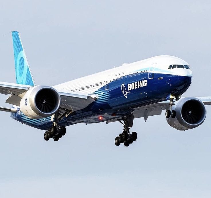 The Boeing 777–9 undergoing a test flight in the sky