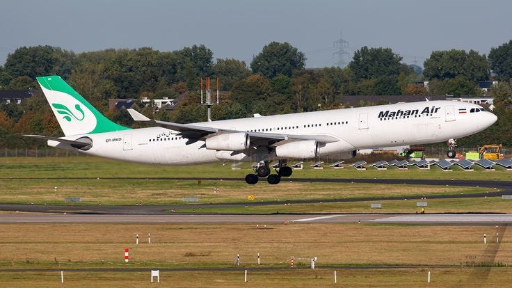 An operational necessity: A Mahan Air Airbus A340–300 (EP-MMD) taxiing for departure. In 2026, Mahan Air remains one of the world’s largest operators of the A340 family, utilizing these quadjets to maintain its international network despite long-standing geopolitical constraints on fleet modernization.
