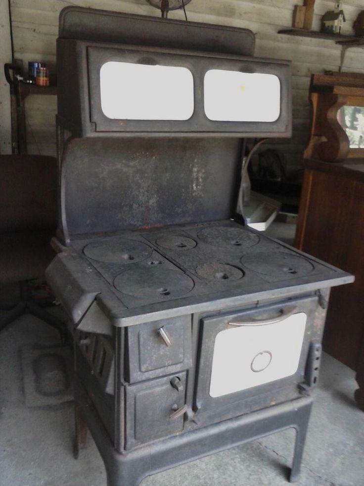 Takin' the fire out. Cast iron, wood-fired cook stoves were… | by Travis  Knowles | Medium