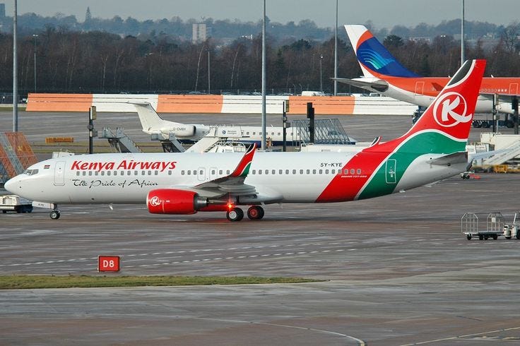 A Kenya Airways Boeing 737 staged at the terminal, representing the airline’s narrowbody operations.