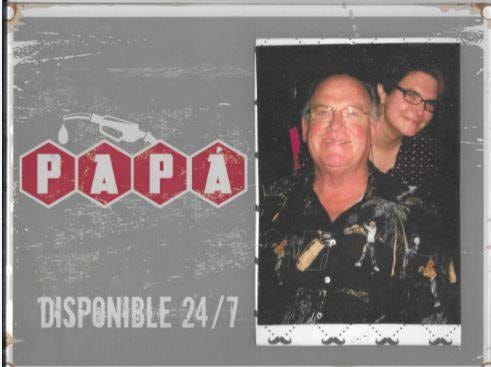 Photo of Mel Blossom standing behind her father next to a “Papa Disponible 24/7” sign, a personal tribute image featured in her Toyota Avanza road trip story about buying the vehicle that launched Mel’s Angels pet transport.