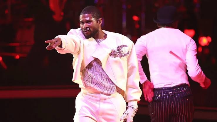 usher skating at super bowl