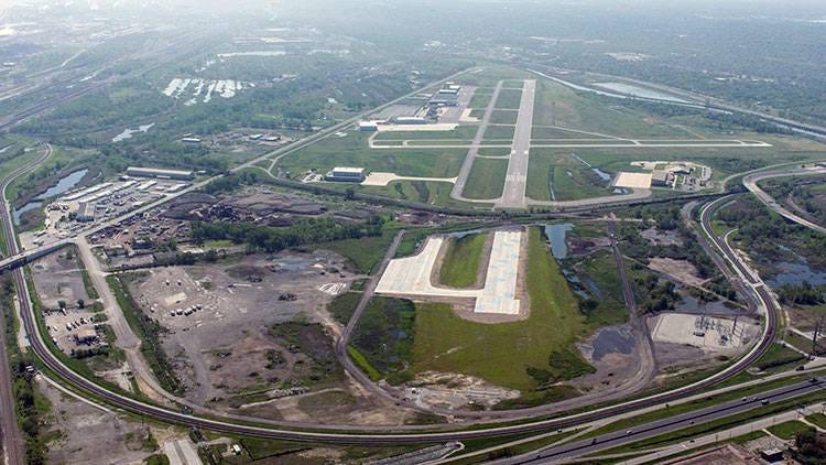 The Gary/Chicago International Airport is seen with Industrial Highway riding to the left (north).