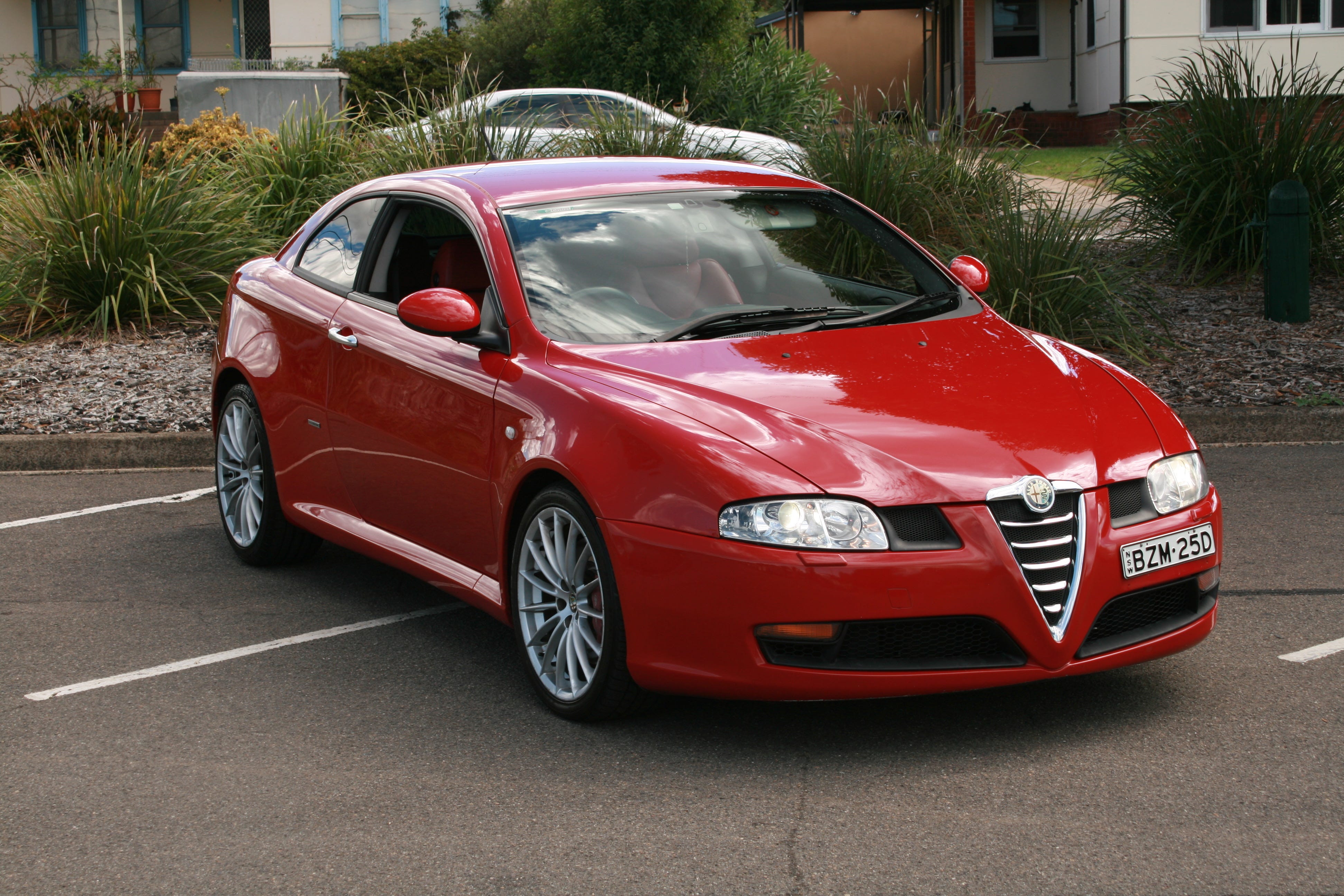 Alfa Romeo GT, hmmmm, mmmm. Hmmm …, by Mike Hollobon