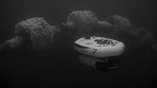 A remotely operated vehicle inspecting underwater structures