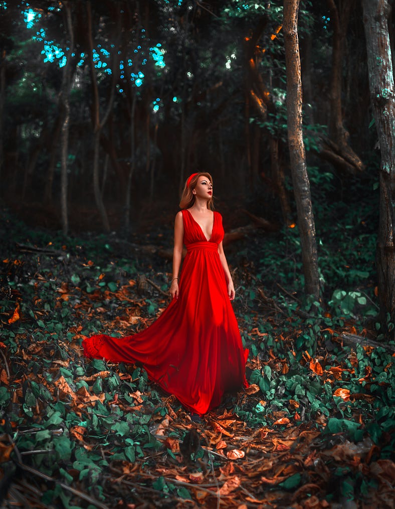 a hero in the story in a red dress