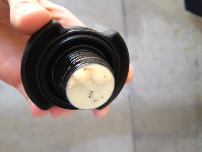 What Is This White Stuff Under My Oil Cap? by The Autoparts Shop Medium