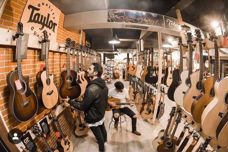 Taylor Guitar's Artistry Across Continents: Where They Are Made? | by Guitar  Top Review | Homebound of Sounds | Medium