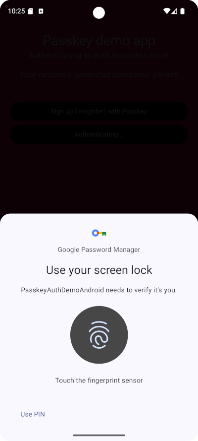 Sign in with passkey screen, asking for fingerprint
