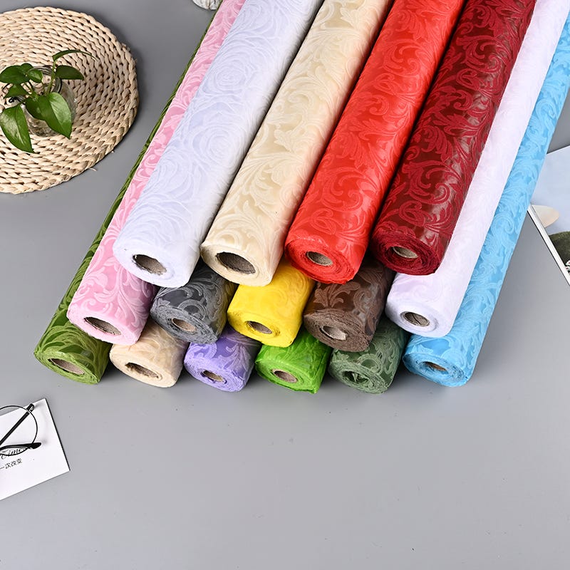 How does the cost of embossed PP nonwoven fabric rolls compare to other synthetic fabrics? by