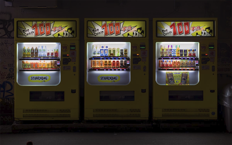 Photo by Julien from Pexels: https://www.pexels.com/photo/night-view-of-vending-machines-in-osaka-japan-30322744/