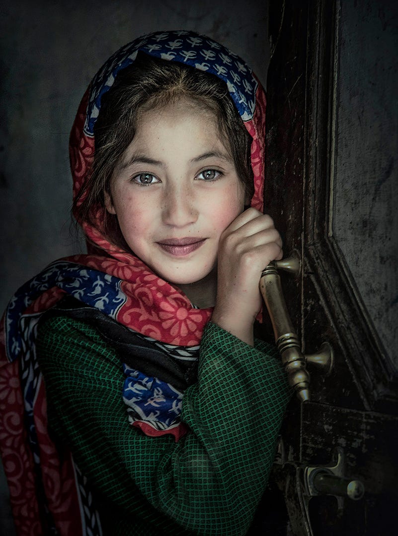 Portrait of a young girl from Turtuk, Ladakh — reflecting Himalayan culture and innocence.
