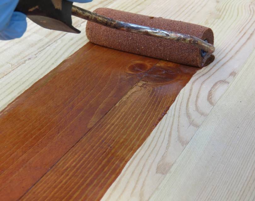Applying stain with a roller deals