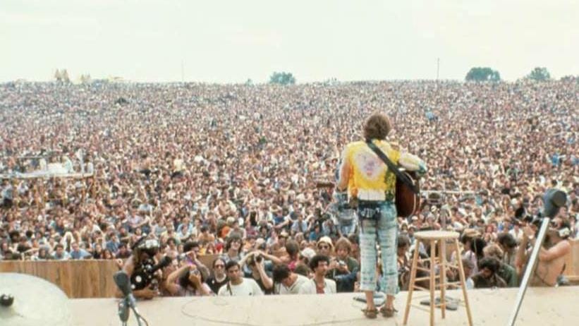 A massive concert crowd enjoying a performance in the record-breaking year.