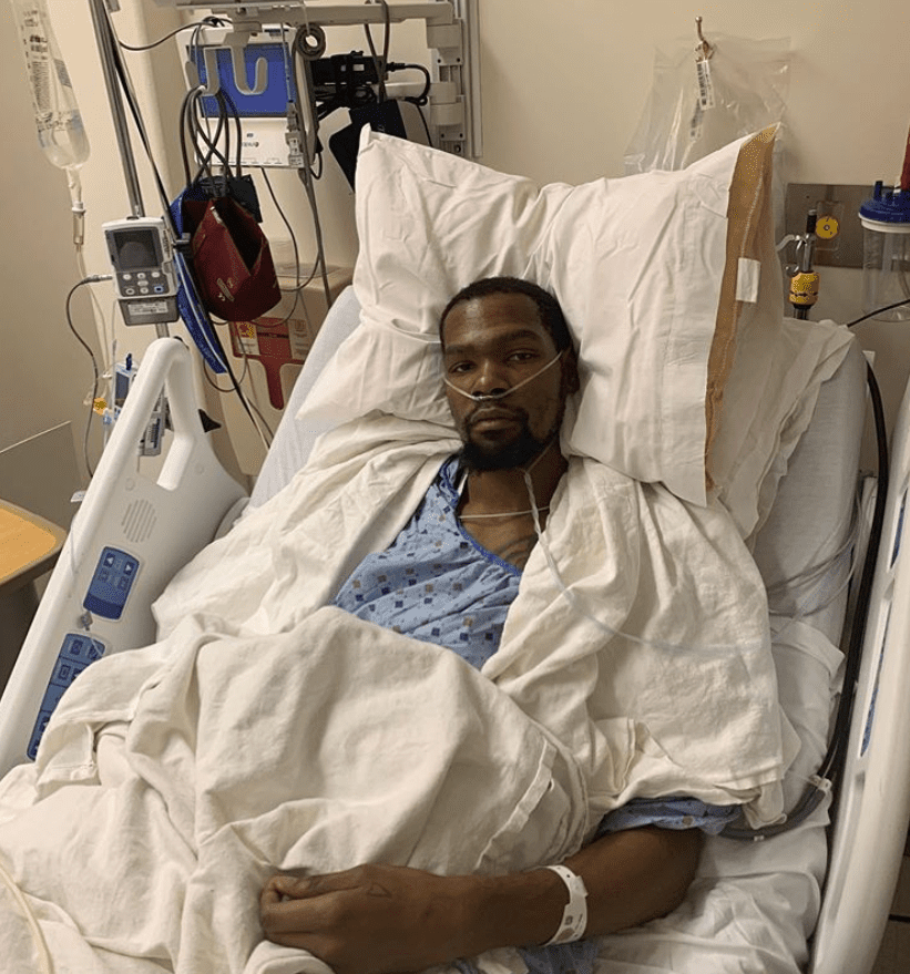 Kevin Durant after tearing Achilles | https://people.com/sports/kevin-durant-cheers-golden-state-warriors-on-after-successful-surgery-for-ruptured-achilles/