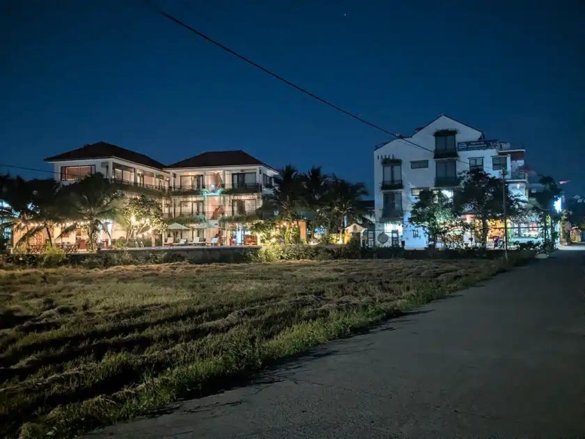 Our hotel at night after biking back from the coworking space. Photo credit: Author